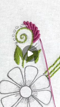 a video demonstrating how to make a flower applique with thread and yarns