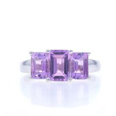 Size: 6 Sizing Fee: Up 1 Size For $30 Or Down 1 Size For $30 Metal Content: 10k White Gold Stone Information Natural Amethysts Carat(S): 1.78ctw Cut: Emerald Color: Purple Total Carats: 1.78ctw Style: Three-Stone Features: Trellis Bridge Measurements Face Height (North To South): 5/16" (7.4mm) Rise Above Finger: 1/4" (6.3mm) Weight: 2.1 Grams Stamps: 10k, Maker's Mark, China Condition: Pre-Owned Professionally Cleaned, Polished, And Tested To Guarantee Metal Content. Purple Stone Ring, Purple Stone Rings, Stone Feature, Emerald Color, Rise Above, Gold Stone, Purple Stones, Three Stone Rings, Multi Stone Ring