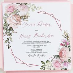 a wedding card with pink roses and greenery