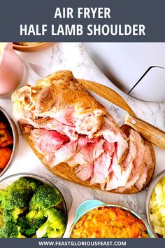 an air fryer half lamb shoulder with broccoli, carrots and other foods