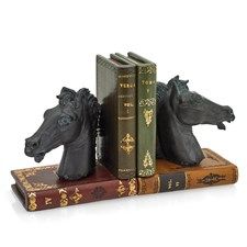 two bookends made out of books with horses head on them, sitting next to each other