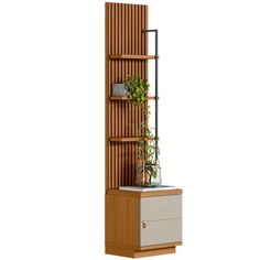 a tall wooden shelf with a plant on top of it and a drawer underneath the shelf