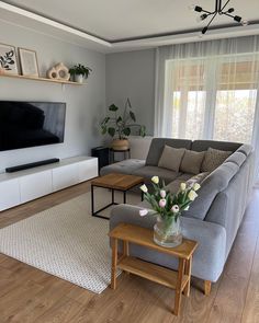 the living room is clean and ready to be used as a home entertainment center or office