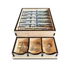 a wooden box filled with lots of money