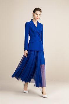 Royal Blue V-neck With Pleated Skirt Blazer Skirt Suits Peak lapels; front button blazer V-Neck, Long sleeves; button cuffs. Structured shoulders. Chest welt pockets. Pleated Skirt V-Neck, Long sleeves; buttons Structured shoulders. Chest welt pockets. Hip flap pockets Polyester 100% Imported Brand - Aision Model Number - 213149C1+S2 V-neck Party Blazer With Buttons, Blue Office Skirt For Fall, Tailored Blue Skirt Suit In Chic Style, Blue Blazer With Button Closure For Party, Elegant Blue Skirt Suit For Fall, Blue Long Sleeve Skirt Suit For Fall, Chic Blue Double-breasted Blazer Dress, Chic Blue Blazer Dress With Buttons, Blue Double-breasted Blazer Dress For Formal Occasions