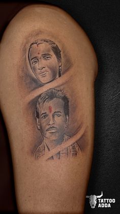 two men's faces are shown on the back of a man's arm