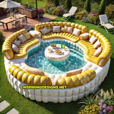 an inflatable couch sitting on top of a lush green field next to a swimming pool