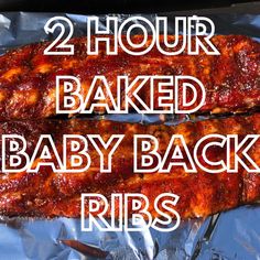 two baked baby back ribs sitting on top of tin foil with the words, 2 hour baked baby back ribs