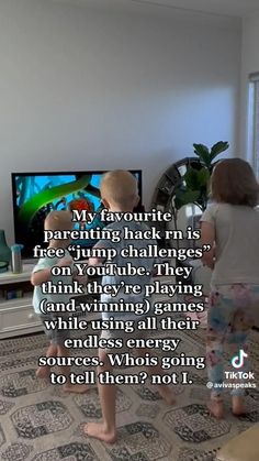 two young children playing video games in front of a tv with the caption, my favorite parent has his free jumping challenge