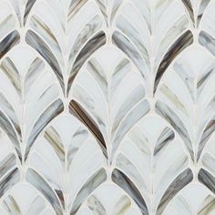 an art deco wallpaper with white and brown designs