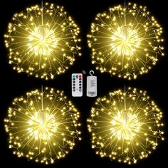 four firework lights with remote controls in the middle one is yellow and three are white