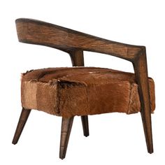 a wooden chair with a fur seat cover on it's armrest and legs