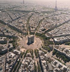 an aerial view of the eiffel tower and surrounding buildings in paris, france