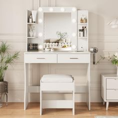 a white dressing table with lights on it and a stool in front of the mirror