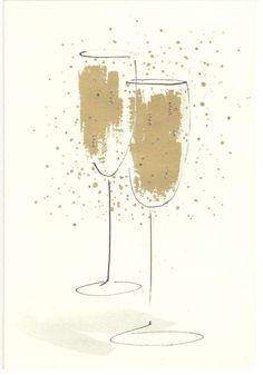 two champagne glasses with gold sprinkles against a white background