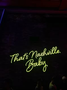 neon sign that says, that's nashville baby