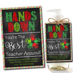 a bottle of hand sanitizer sitting next to a sign that reads hands down you're the best teacher around