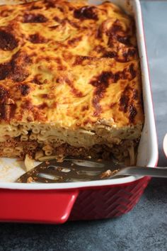 a casserole dish with meat and cheese in it, ready to be eaten