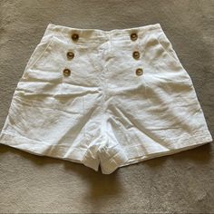 White Linen Tan Brown Button Front Shorts With Elastic Waist In Back And Pockets New With Tags 25” Waist 12.5” Rise 3” Inseam Open To Offers! Cotton Bottoms With Buttons For Vacation, Cotton Beach Shorts With Buttons, Beach Cotton Shorts With Buttons, Summer Beach Shorts With Buttons, Summer Bottoms With Buttons For Vacation, Summer Style Bottoms With Buttons For Vacation, Summer Vacation Shorts With Button Closure, Trendy High-waisted Shorts With Buttons, Beach Shorts With Buttons