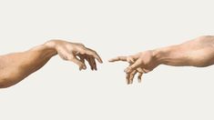 two hands reaching out towards each other