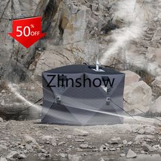 a black box with the word zinnshow on it in front of some rocks