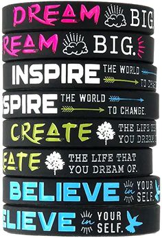 four bracelets with words on them that say dream, inspire, inspire and create