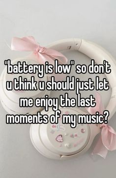 a white headphone with pink bows on it and the words battery is low so don't u think i should