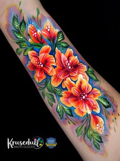 an arm with flowers painted on it