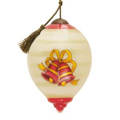 a glass ornament with two bells and bows hanging from it's side