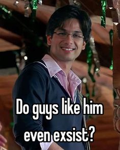 a man wearing glasses and smiling with the caption do guys like him even exisst?