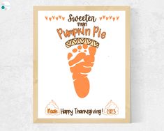 an orange poster with the words sweetest than pumpkin pie and a hand print on it