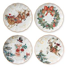 four plates decorated with christmas decorations and santa's sleighs