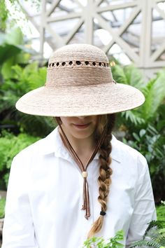 An asymmetrical brim makes this hat ideal for a day spent in the sun, each one hand-woven using sustainable palm fibers and finished with a suede strap. Garden Boots, Gardening Outfit, Gardening Gloves, Hot Cars, Bandanas, Straw Hat, Cleaning Clothes, Lattice, Sun Hats