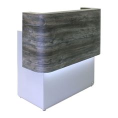 a white and grey reception desk with wood grain design