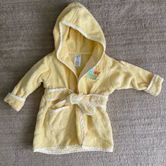 Brand New With Out Tags! 100% Cotton Yellow Baby Robe With Embroidered Detail Of Elephant, Giraffe, And Tiger! Cute Gift And Perfect For After Bath Time. Open To Reasonable Offers Through Feature! No Trades! Baby Robes, After Bath, Yellow Baby, Baby Yellow, Cute Gift, Bath Time, Cute Gifts, Yellow White, Kids Shop