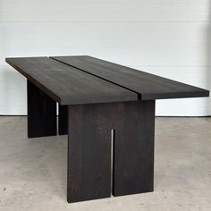 An open joint table provides a detailed visual approach to a standard table design.  An intense black, slab leg, modern design.  Tables will be built using Oak, Elm or Ash hardwood material.  Standard width: 36" Standard height: 30"  O R D E R I N G// -Please choose the size in the drop down menu.  -COLOR: When purchasing a standard table from the listing your table will be finished in an intense black, hard wax oil.  *Other finish colors available upon request once an order is placed.  CUSTOM O Modern Black Dining Table Wood Sintered Stone Too, Charred Wood Table Top, Black Waxed Furniture, Modern Dining Table Black, Hardwood Dining Table, Black Dining Table, Pallet Wine Rack, Live Edge Furniture, Black Dining