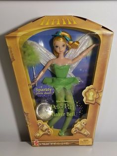 the tinker bell doll is in its box