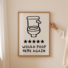 a woman standing in front of a poster that says would poop here again