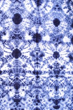 an abstract blue and white tie dye background