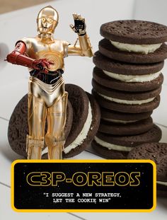 a star wars character is standing next to some cookies