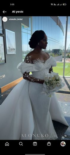 a woman in a white wedding dress holding a bouquet