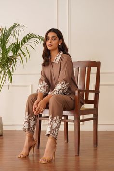 PRODUCT DETAIL: Introducing our "Blossom Brown Embroidered Co-ord Set" – a testament to grace and sophistication. This ensemble features a rich brown linen fabric adorned with exquisite white floral embroidery that adorns the collar, sleeves, and pant borders, adding a touch of timeless charm. Delicate pintex detailing Cord Sets Formal, Embroidery Co Ord Set, Linen Co Ord Sets Women, Coord Sets For Women 2024, Pakistani Co Ord Sets, Linen Coord Set, Velvet Co Ord Set, Linen Co Ord Set