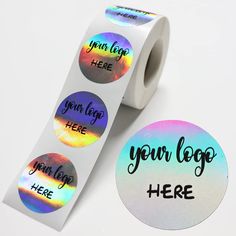 a roll of stickers with the words your logo here on them