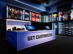 a large display case in the middle of a room with lots of items on it