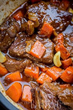 beef stew with carrots and potatoes in a crock pot, ready to be eaten