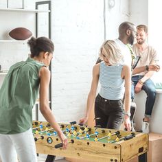 Our green football field surface and the color-coordinated blue and yellow players realistically recreate the atmosphere of a football match. The rounded table corners, ergonomically designed handles, and scoring device add safety and functionality to our foosball table. Small Games Room, Rounded Table, Arcade Table, Table Soccer, Small Game Rooms, Football Table, Foosball Table, Soccer Table, Foosball