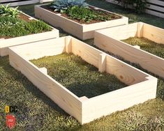 four wooden planters with plants in them on the grass