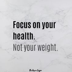 a marble wall with the words focus on your health not your weight