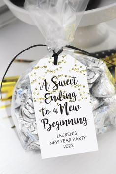 a sweet ending to a new year's party tag on a bag of candy