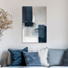 a living room with blue and white decor